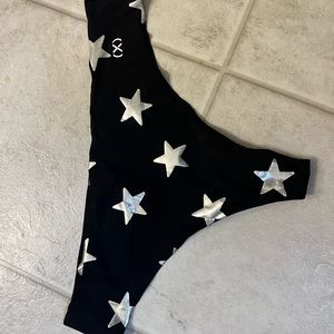 Large assortment of new, unused panties and thongs from name brands; size XS/S